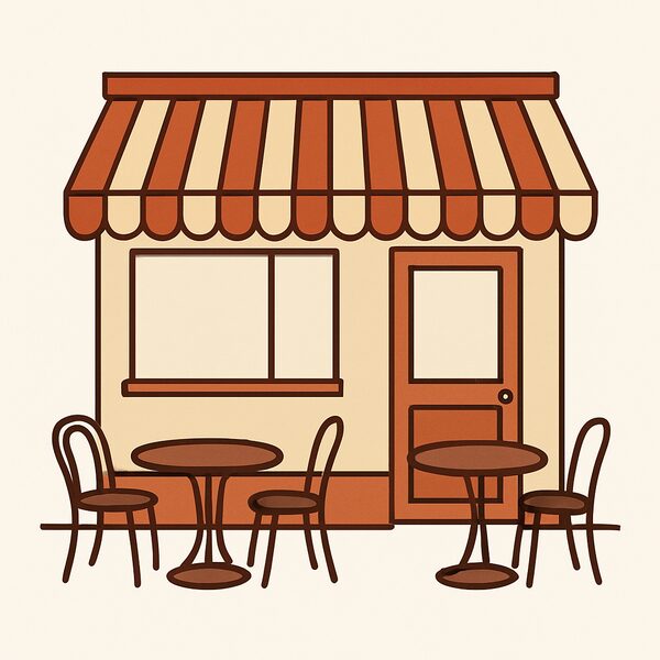 The outside of a café with tables on the pavement